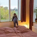 Huisje op Bioboerderij, kust, polder en rust